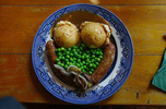 bangers and mash with peas and gravy